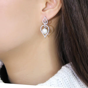 TS510 - Rhodium 925 Sterling Silver Earrings with Semi-Precious Glass Bead in White